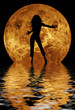 woman dancing in front of moon woman dancing in front of moon