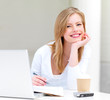 Young woman making notes