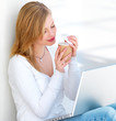 Young woman with coffee cup