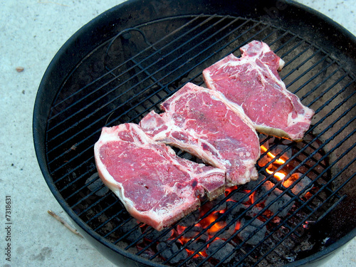 Photo: Angle of T-Bones on the Grill Angle of T-Bones on the Grill