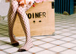 Young woman wearing net stockings