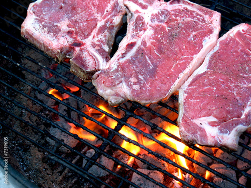 Photo: Grilling a T-Bone Grilling a T-Bone