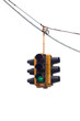 Green traffic light hanging from a cable, isolated on white.