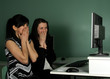 Two girls at the computer