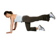 Female fitness trainer doing her leg raises