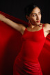 Portrait of hispanic female wearing red clothes