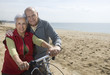 Active senior couple biking
