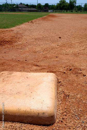 Photo: Baseball base on infield diamond Baseball base on infield diamond