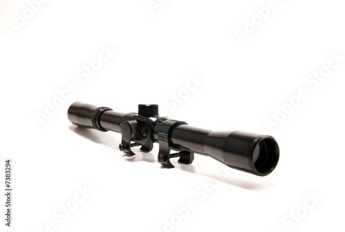 Photo: A gun scope 4x20 on a white seemless background. A gun scope 4x20 on a white seemless background.