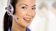 Friendly Call Center Rep with Headset in Office Setting Friendly Call Center Rep with Headset in Office Setting