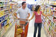 Couple shopping in supermarket