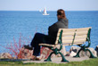 Photo: Man watching sail boats Man watching sail boats