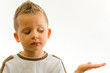 Child showing something on hand