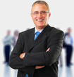 Casual smiling business man standing