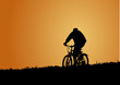 Man on bike in the evening Man on bike in the evening
