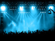 Cheering crowd at concert, musicians on the stage Cheering crowd at concert, musicians on the stage