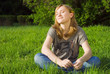 Photo: Pretty young girl on the grass Pretty young girl on the grass