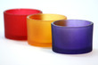 row of glass candle holders..