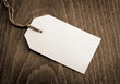 Blank tag on wooden background Blank tag on wooden background