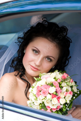 Photo: portrait of the bride in the wedding car portrait of the bride in the wedding car