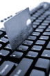 Credit card on computer keyboard