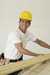 Construction worker in hard hat, smiling, portrait