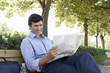 Businessmen Reading Newspaper
