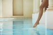 Woman Testing the Waters