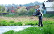 Fisherman angling on the river