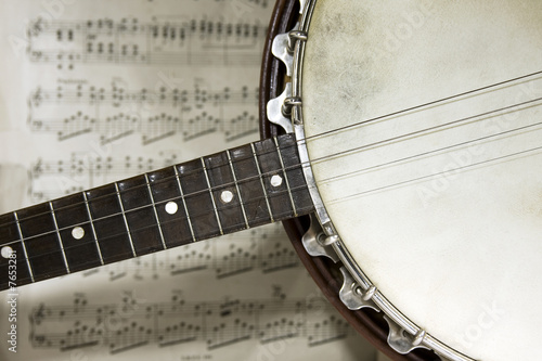 Photo: grunge banjo with score background grunge banjo with score background