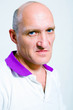 Portrait of the man indignation. Blue eyes. Bald