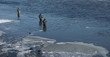 Fishermen on river.