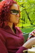 Beautiful young women on bench in park