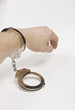 Photo: mans hand handcuffed mans hand handcuffed