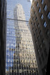Skyscraper reflecting at glass facade