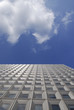 Structured facade of modern office building with windows