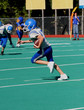 Youth Teen Football Player Running With the Ball Youth Teen Football Player Running With the Ball