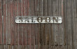 Old Saloon Sign on Weathered Wood Wall