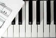 Piano keys with published music