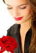 Portrait of woman with red rose