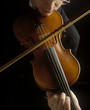 Young man practicing violin