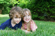 2 kids in the grass