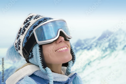 Photo: Portrait of young woman against a background of the mountains Portrait of young woman against a background of the mountains