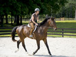 Young women horseback riding