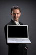 Man holding laptop