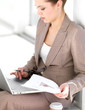 Businesswoman using laptop