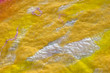 yellow wool and silk textured background close-up