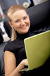 Photo: business woman on a laptop at home business woman on a laptop at home