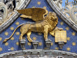 Golden Venetian lion on San Marco cathedral Golden Venetian lion on San Marco cathedral