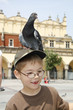 Boy is feeding the birds